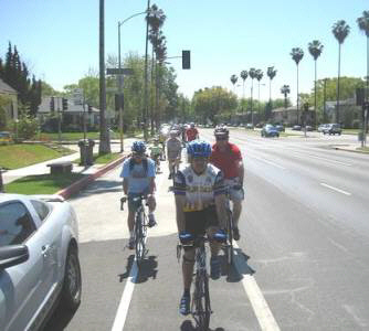 Bicyclists ride along the newly installed bike lane in Glendale.