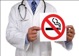Doctor holding non-smoking sign